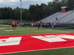 It's the Marquette Redmen football against the Escanaba Eskymos.