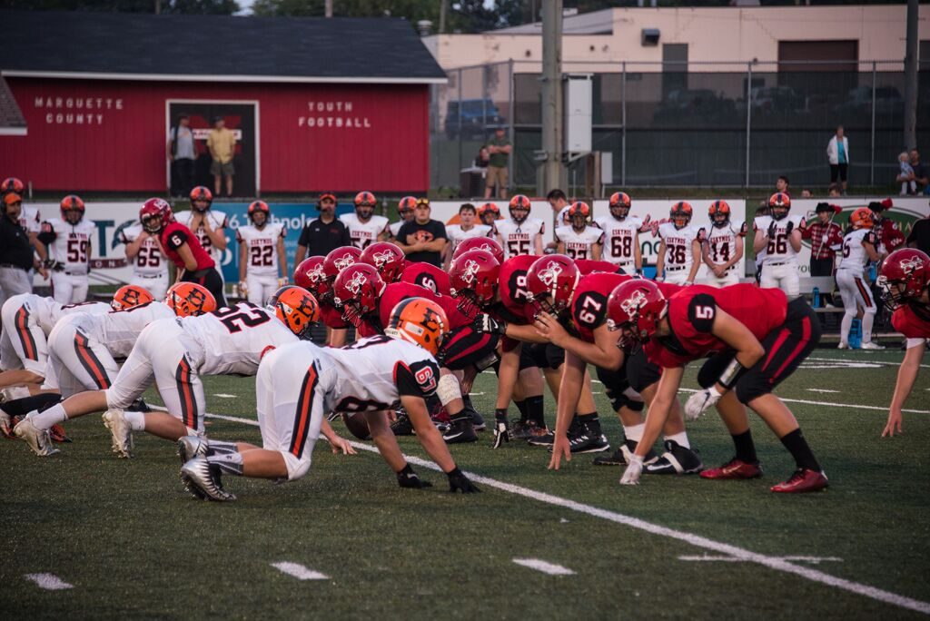 The Marquette Redmen take on the Escanaba Eskymos.