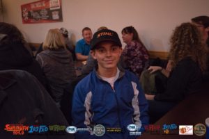 This kid won a new ball cap!