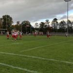 The Redmen warm up for a Kingsford Flivvers match-up.