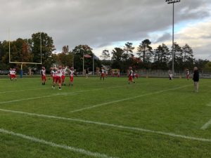 The Redmen warm up for a Kingsford Flivvers match-up.