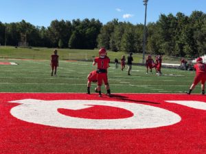 The Redmen prepare to take on the Petoskey Northmen.