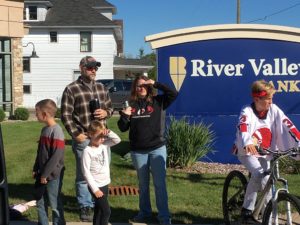 Cheering on the Redmen in front of River Valley Bank.