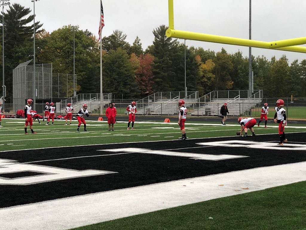 The Marquette Redmen prepare to take on the Lakeland Union Thunderbirds.