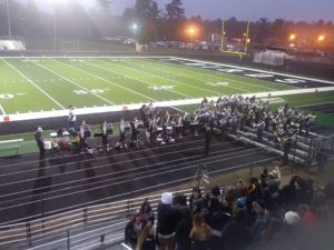 The Thunderbirds' marching band celebrates the Lakeland Union homecoming against the Marquette Redmen.