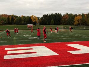 The Marquette Redmen prepare to take on the Gladstone Braves.