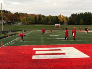 The Marquette Redmen warm up for a battle against the Gladstone Braves.