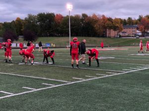 The Redmen warm up to face off against the Gladstone Braves.