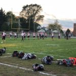 The Marquette Redmen warm up ahead of their bout against the Menominee Maroons.