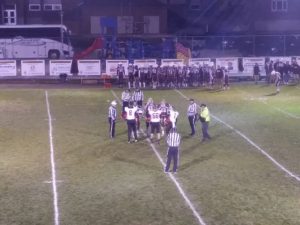 The Marquette Redmen clash with the Menominee Maroons.