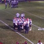 The Redmen huddle up.