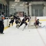 The Redmen with some action at the net!