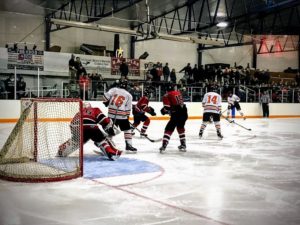 Some Redmen action at the goal.