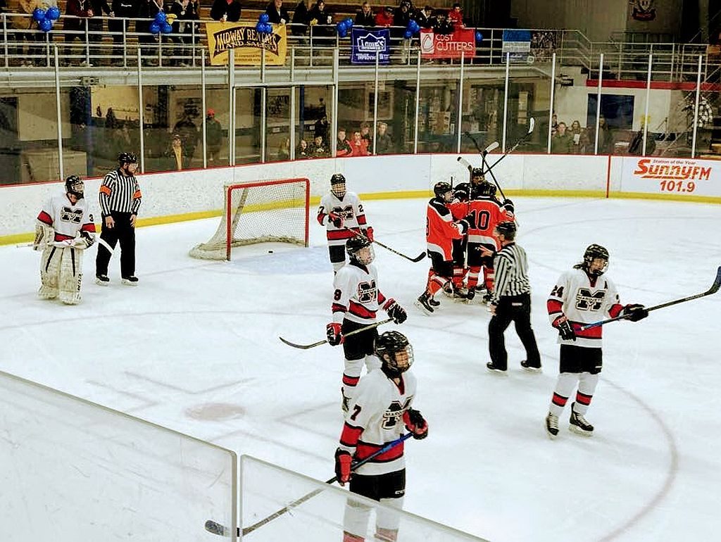 It was the Marquette Redmen vs the Houghton Gremlins in game three of the season.