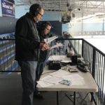 John and Joe set up for a Redmen bout against the Utica Eisenhower Eagles.