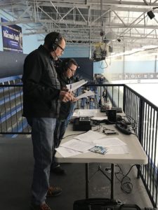 John and Joe set up for a Redmen bout against the Utica Eisenhower Eagles.