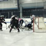 Ryan Baldwin enters the fray close to the Eagles' net.