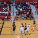 The Redettes in control of the ball going for another basket.