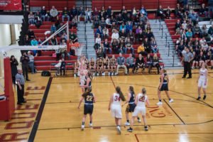 The Redettes in control of the ball going for another basket.