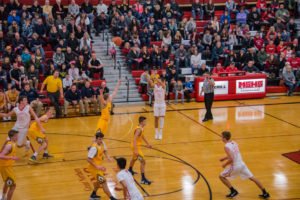 The Marquette Redmen take a shot to regain control of the game.