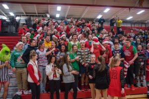 The Marquette Redmen student section got decked out in Christmas gear and cheered on their boys.