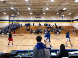 The Flivvers warm up on their home court.