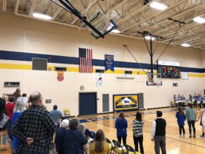 The national anthem plays before the start of the game.