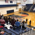The National Anthem plays ahead of the Redettes-Northmen match-up.
