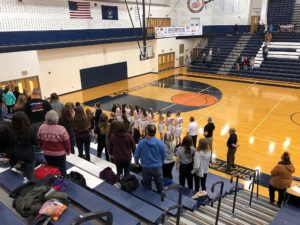 The National Anthem plays ahead of the Redettes-Northmen match-up.