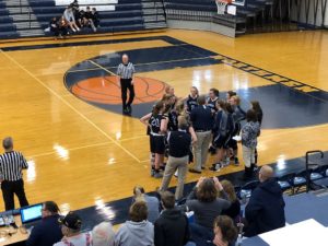 The Petoskey Northmen huddle up.