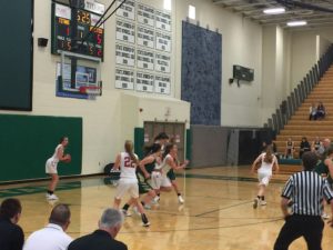 The Redettes move aggressively against the Titans.