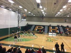 The Hornets warm up for their bout against the Redmen.