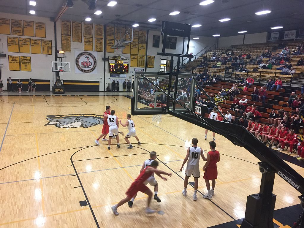 The Redmen took on the Trojans at Traverse City.