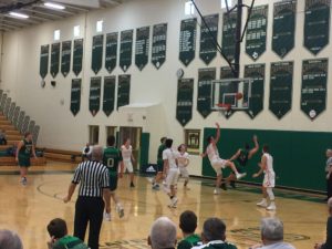 Some action under the basket.