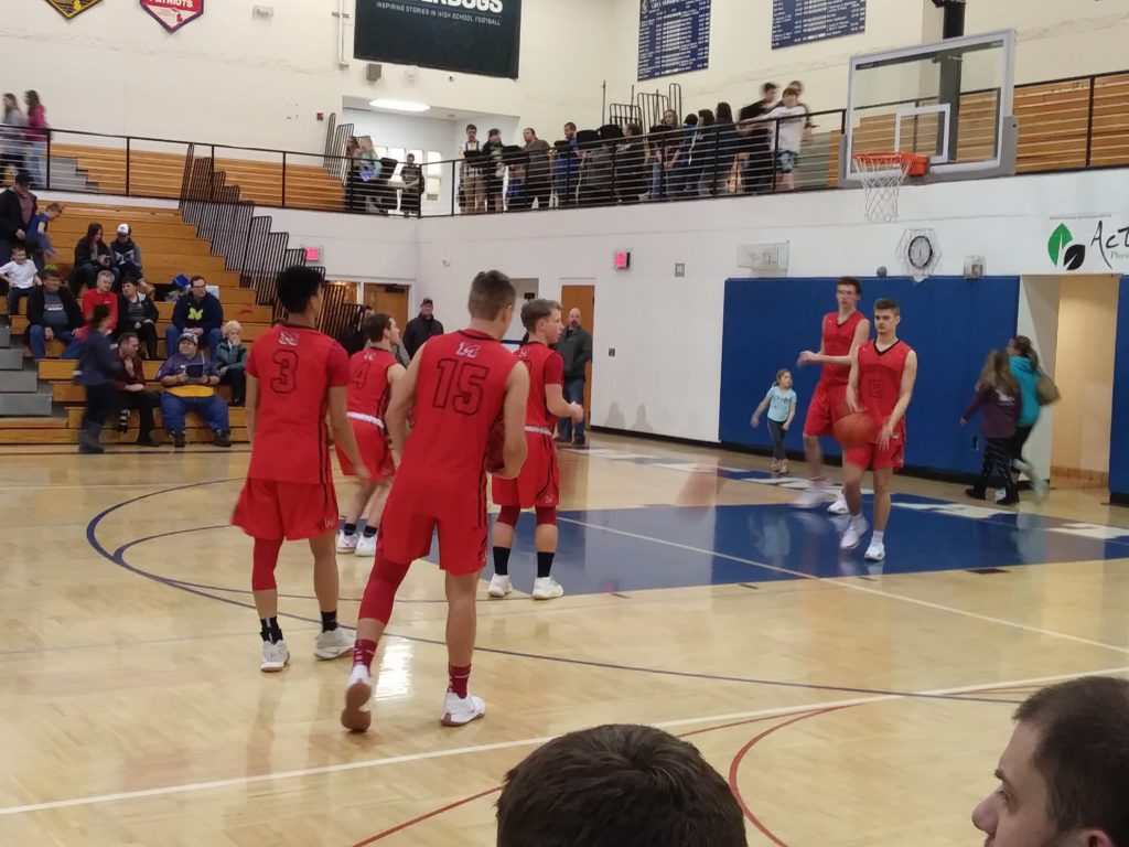 The Redmen warm-up before the game.