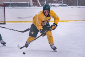 Breaking away with the puck.