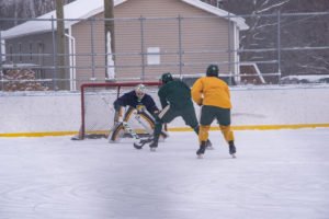 Going in for a shot on goal.