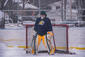 The yellow side's goalie.