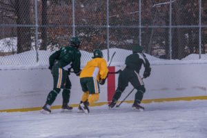 Some strong defense from the Green team, stealing the puck away.