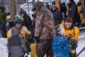 Little "future NMU hockey players" talking to their local stars.