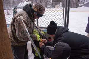 This kid went home with a signed NMU Hockey T-shirt!