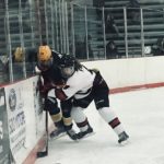 Ansel Frost gives a Blue Devil some trouble.