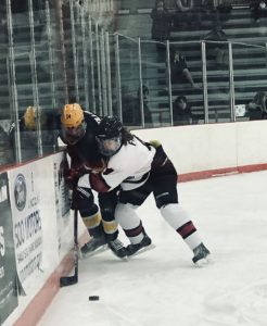 Ansel Frost gives a Blue Devil some trouble.