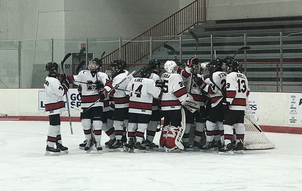 The Redmen celebrate a successful weekend!