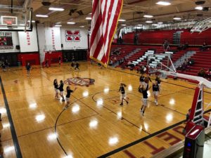 Redettes warm up ahead of bout against Calumet.