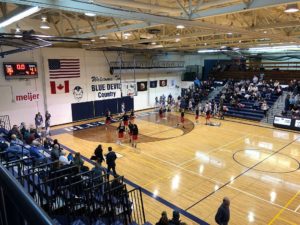 The Redettes clinched a 47-42 victory over the Blue Devils.