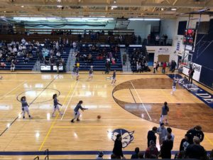 The Blue Devils warm up.