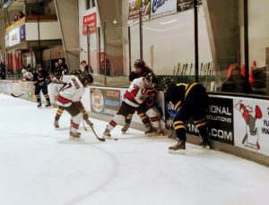 The Redmen defeated the Grand Haven Buccaneers tonight 7-3.