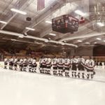 The players take the ice.