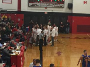 The Redmen huddle up.